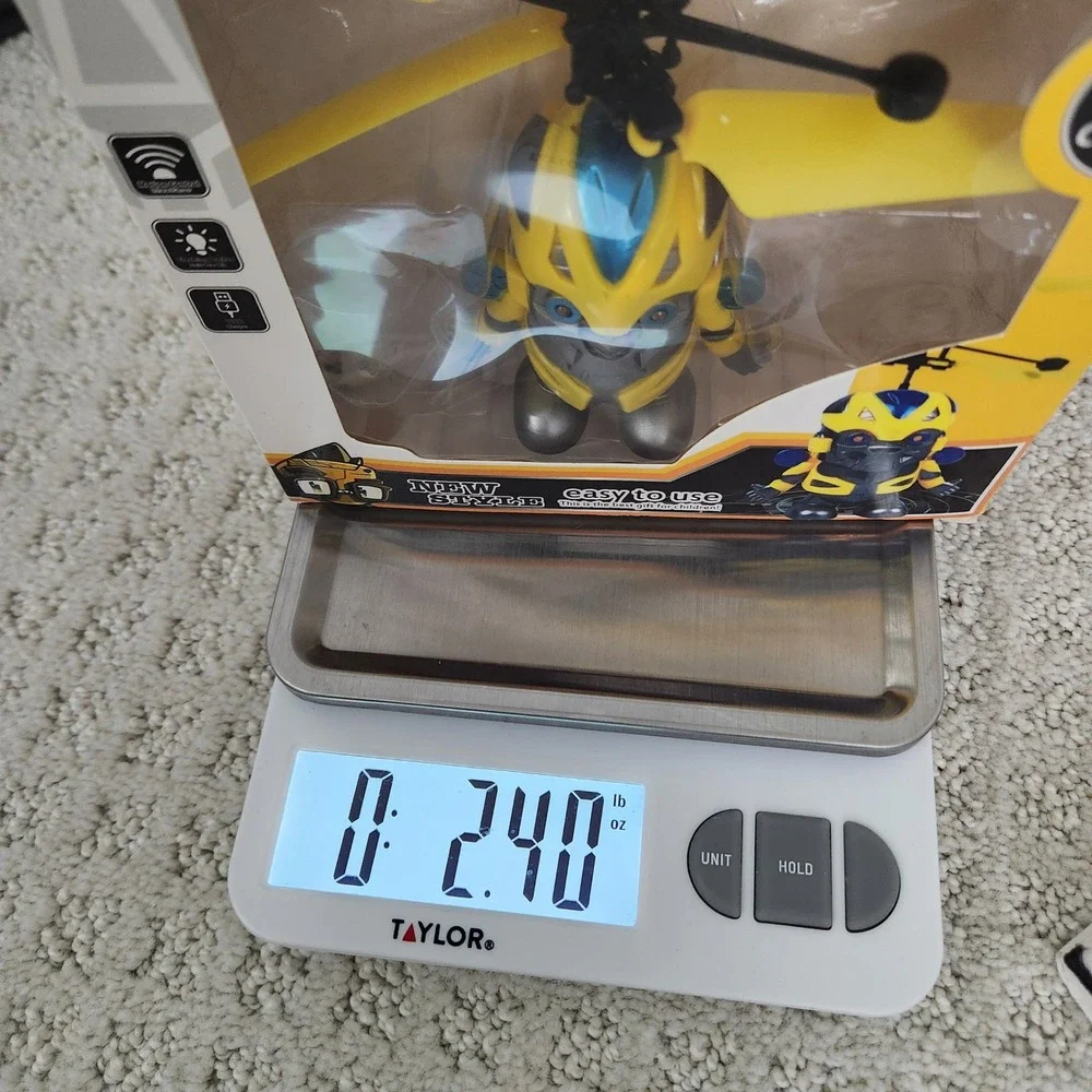 Mechanical Man Induction Vehicle NO.5058 Yellow Blue Flying Robot Toy USB Charge